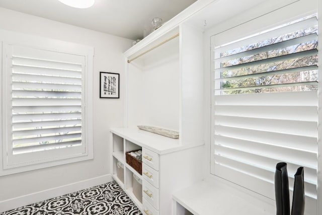 spacious closet featuring tile patterned flooring