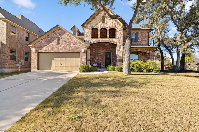 view of front of property with a front yard and a garage