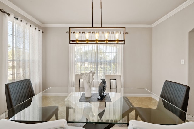 dining area with ornamental molding and an inviting chandelier