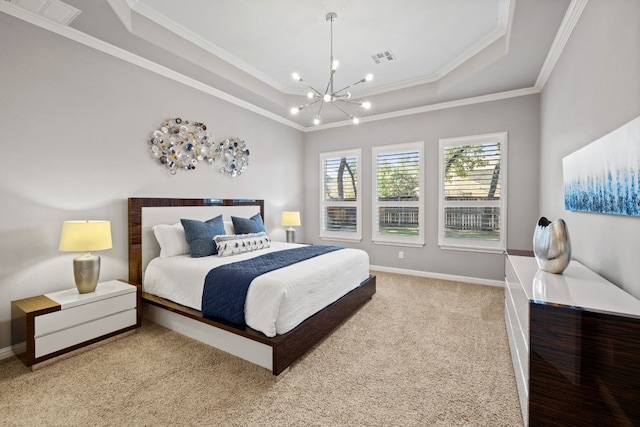 carpeted bedroom featuring a tray ceiling, ornamental molding, and an inviting chandelier