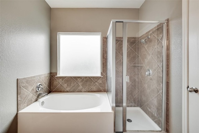 bathroom with independent shower and bath