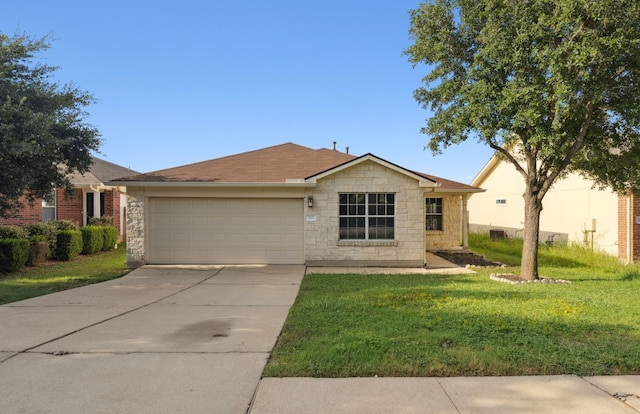 single story home with an attached garage, driveway, stone siding, and a front yard