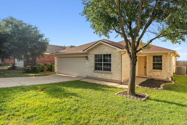 ranch-style home featuring cooling unit, a garage, driveway, stone siding, and a front yard