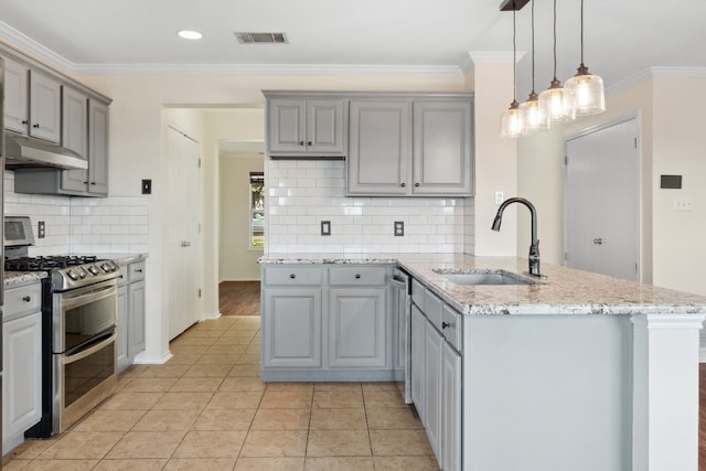 kitchen with gray cabinetry, sink, and appliances with stainless steel finishes