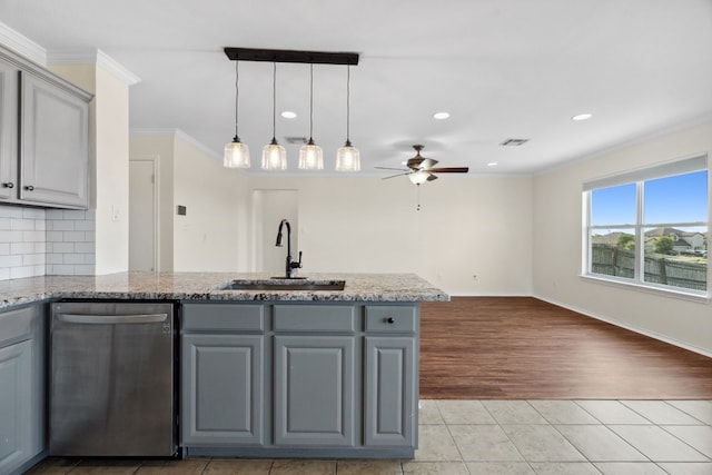 kitchen with gray cabinetry, dishwasher, sink, ceiling fan, and ornamental molding