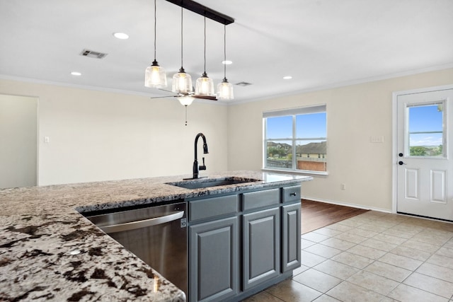 kitchen with gray cabinetry, sink, stainless steel dishwasher, and ornamental molding