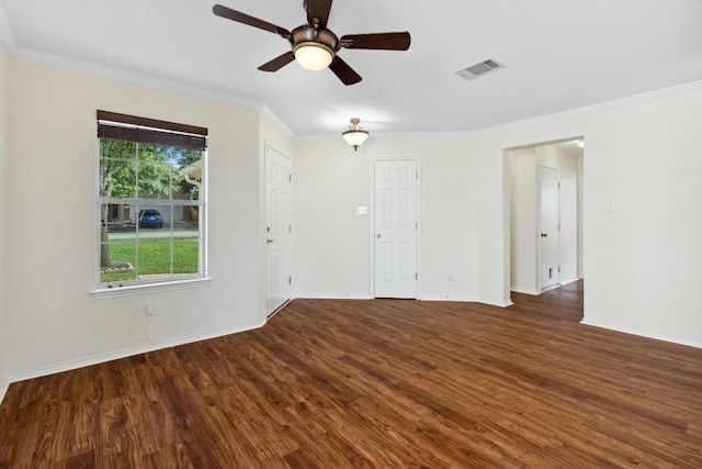 unfurnished room featuring crown molding, dark hardwood / wood-style flooring, and ceiling fan