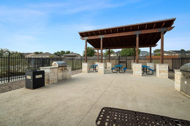 view of patio / terrace with an outdoor kitchen and grilling area