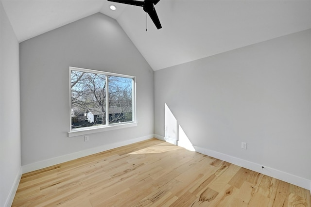 interior space featuring light wood-type flooring, vaulted ceiling, and ceiling fan