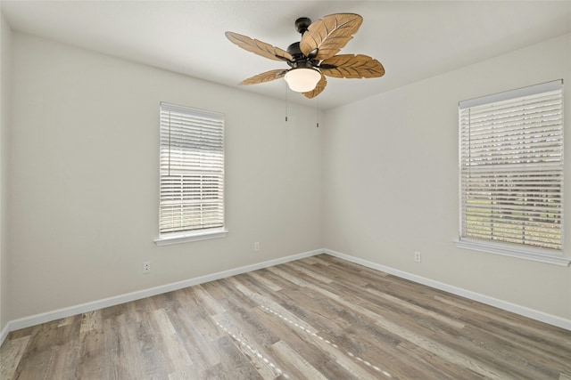 unfurnished room with a wealth of natural light and light wood-type flooring