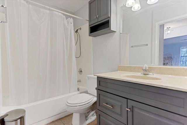 full bathroom with tile patterned floors, vanity, toilet, and shower / bath combo