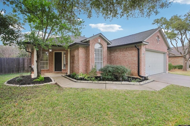 ranch-style home with a front yard and a garage