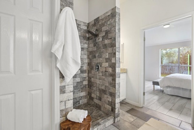 bathroom with a tile shower