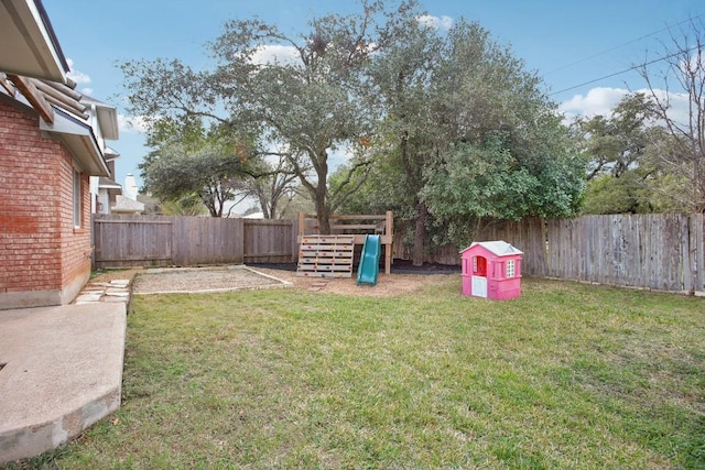 view of yard with a playground