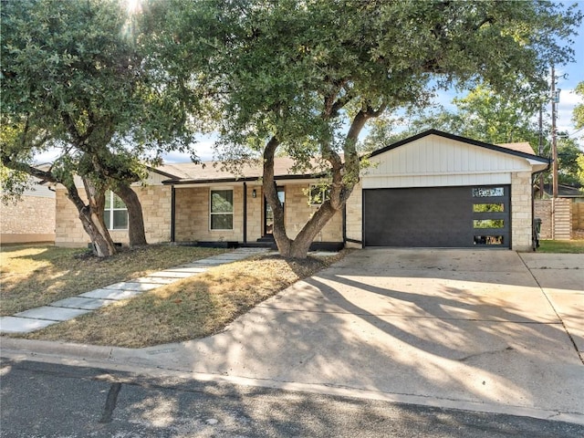 ranch-style home with a garage