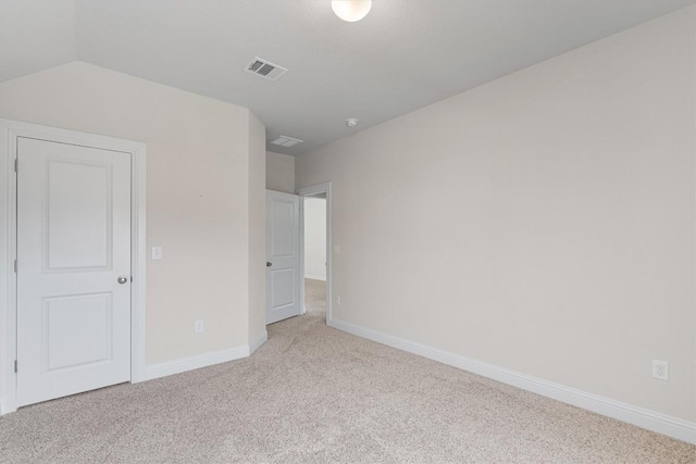 unfurnished bedroom with light carpet