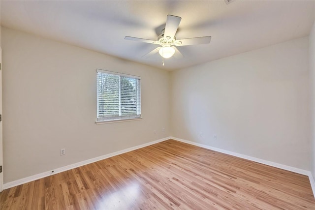 spare room with ceiling fan and light hardwood / wood-style floors