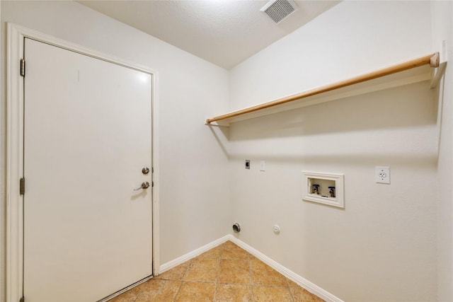 washroom with electric dryer hookup, hookup for a gas dryer, and hookup for a washing machine