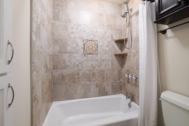 bathroom featuring toilet and shower / bath combo with shower curtain