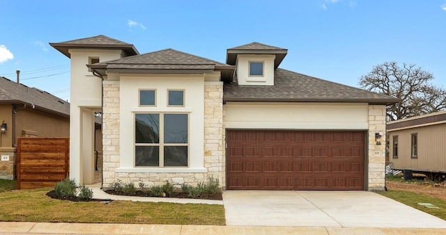 view of front of property with a garage