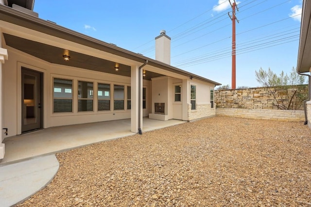 rear view of house with a patio area