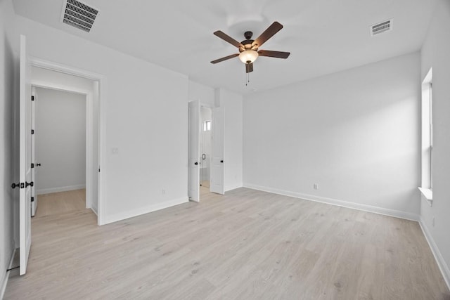 unfurnished bedroom featuring light hardwood / wood-style flooring and ceiling fan