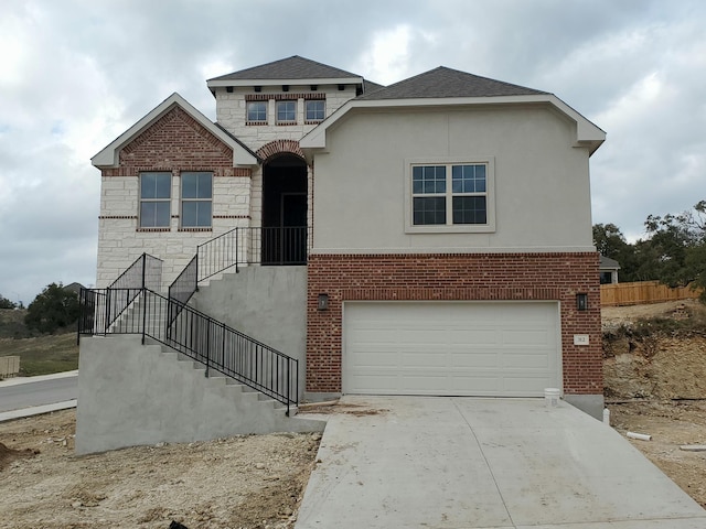 view of front of property with a garage