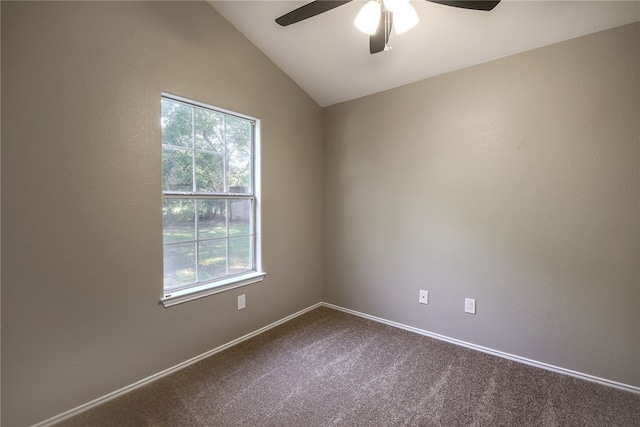 2306 W St, Taylor, TX 76574 - unfurnished room featuring plenty of natural light, ceiling fan, dark colored carpet, and vaulted ceiling