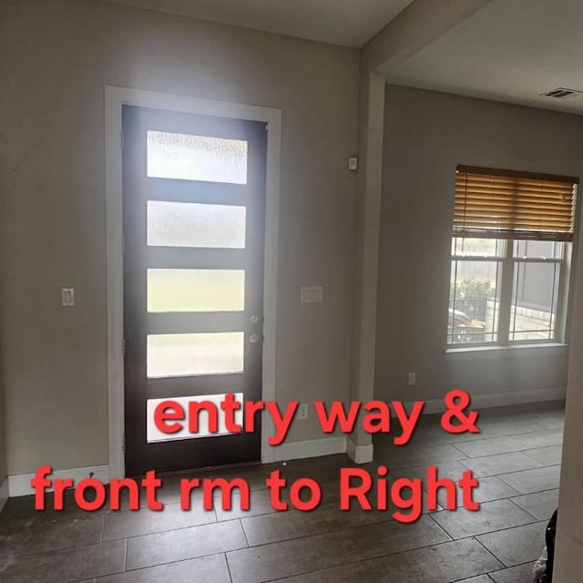 entrance foyer with tile patterned flooring