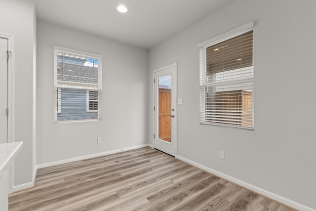 empty room featuring light hardwood / wood-style floors