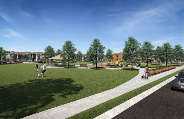 surrounding community featuring a gazebo, a playground, and a lawn