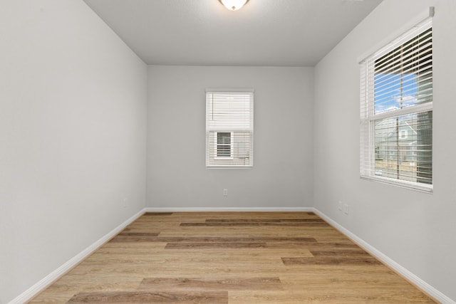 empty room featuring light hardwood / wood-style floors