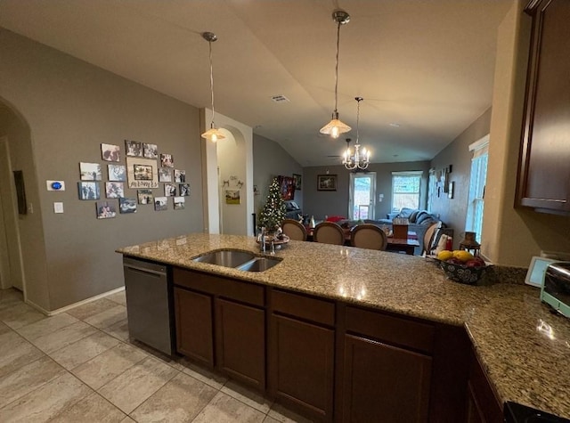 kitchen with stainless steel dishwasher, light stone counters, dark brown cabinetry, and vaulted ceiling