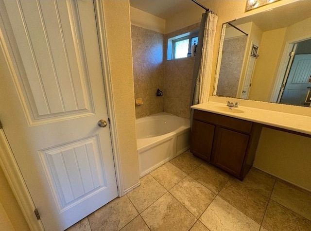 bathroom with tile patterned flooring, vanity, and shower / tub combo