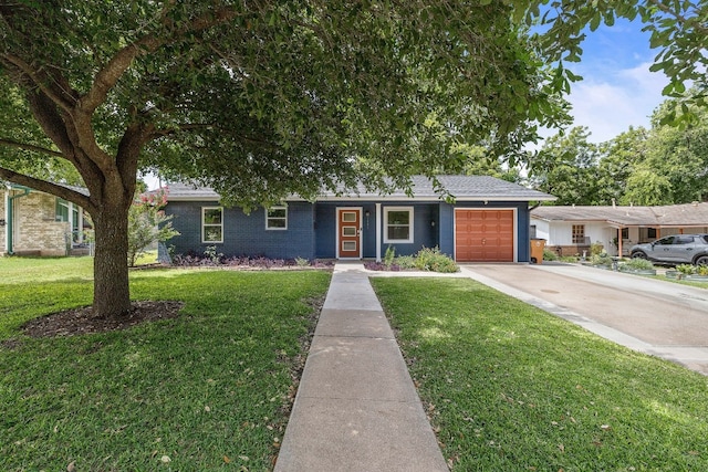 ranch-style house with a front yard and a garage