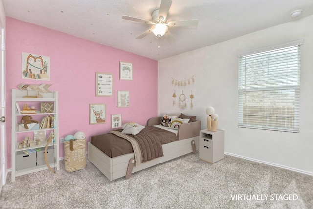 carpeted bedroom featuring ceiling fan