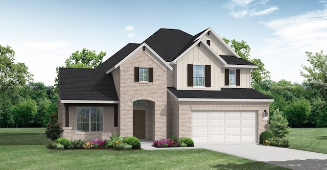 view of front facade with a front yard and a garage