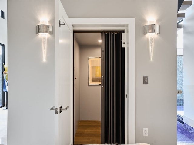 hall featuring wood-type flooring