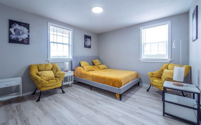 bedroom featuring light wood-type flooring