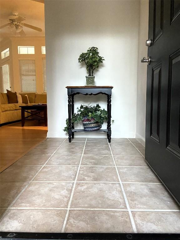 9525 N Capital Of Texas Hwy Unit 623, Austin, TX 78759 - corridor with light tile patterned floors and baseboards