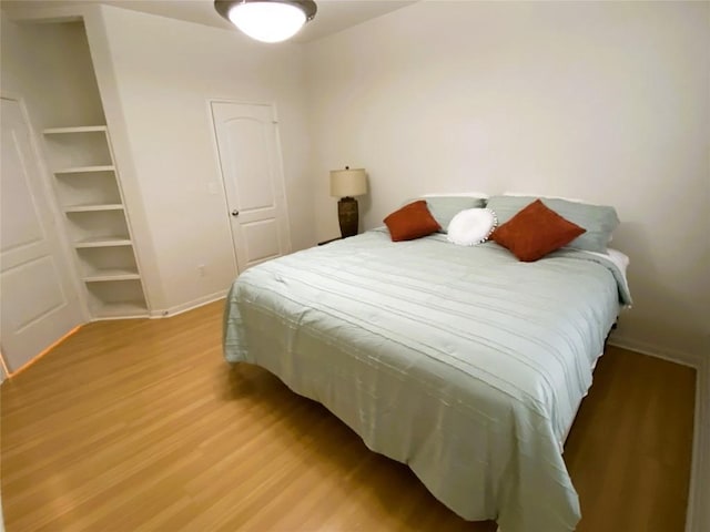 bedroom featuring hardwood / wood-style flooring