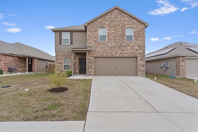 front of property featuring a garage and a front lawn