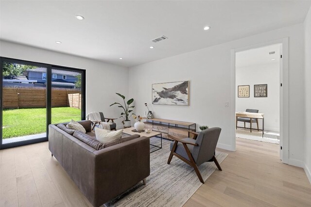 4505 Shoal Creek St, Austin, TX 78756 - living room featuring light wood finished floors and recessed lighting
