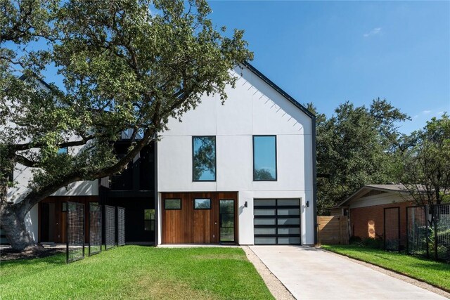 4505 Shoal Creek St, Austin, TX 78756 - modern home with driveway and a garage