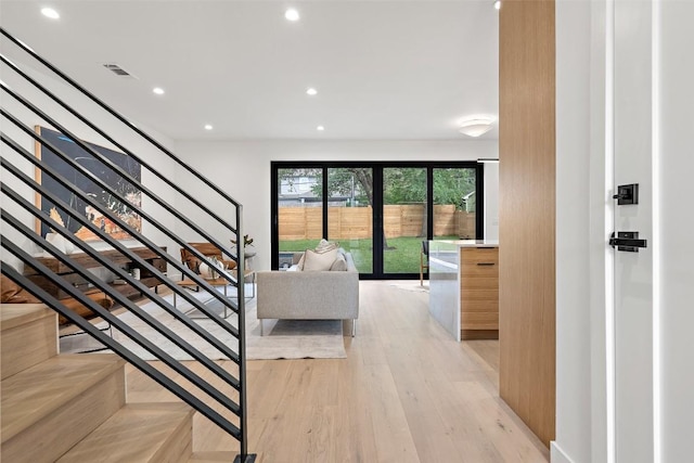 4505 Shoal Creek St, Austin, TX 78756 - entrance foyer with recessed lighting, light wood-style floors, and stairway
