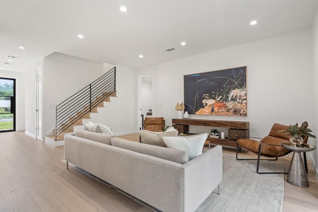 4505 Shoal Creek St, Austin, TX 78756 - living area with recessed lighting, light wood-style floors, and stairs