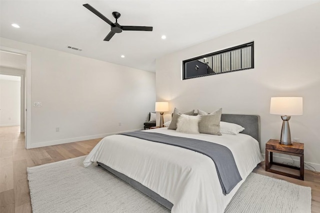 bedroom featuring ceiling fan and light wood-type flooring