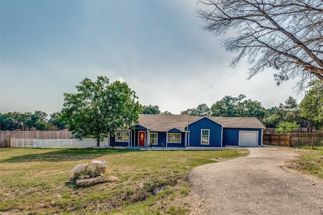 560 Persimmon Pass, Fischer, TX 78623 - single story home with asphalt driveway and a garage
