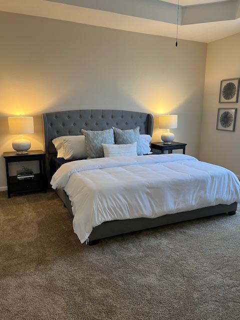 bedroom featuring carpet flooring