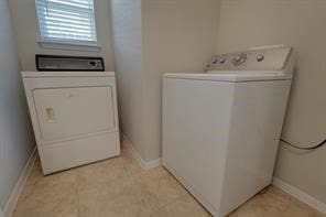 laundry area featuring separate washer and dryer